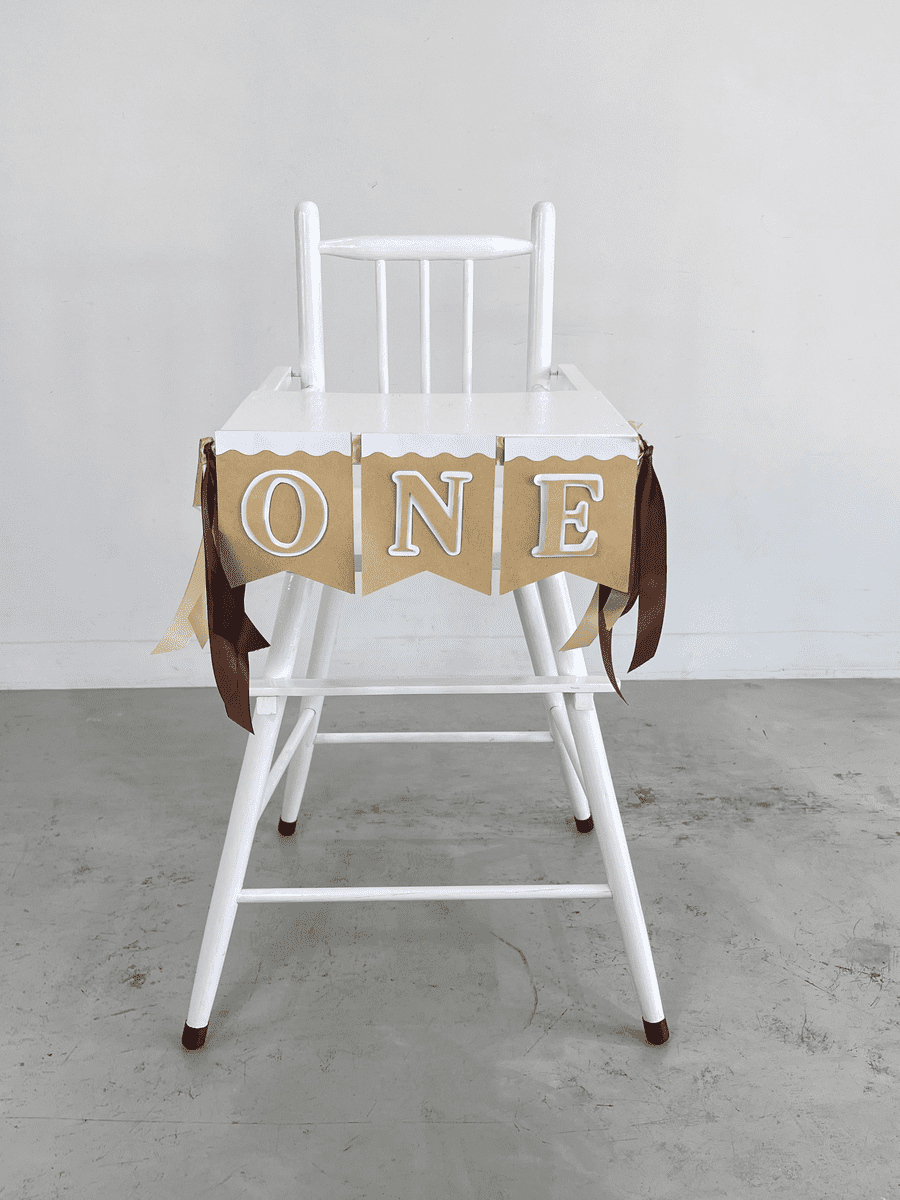VINTAGE HIGH CHAIR W/ BUNTING